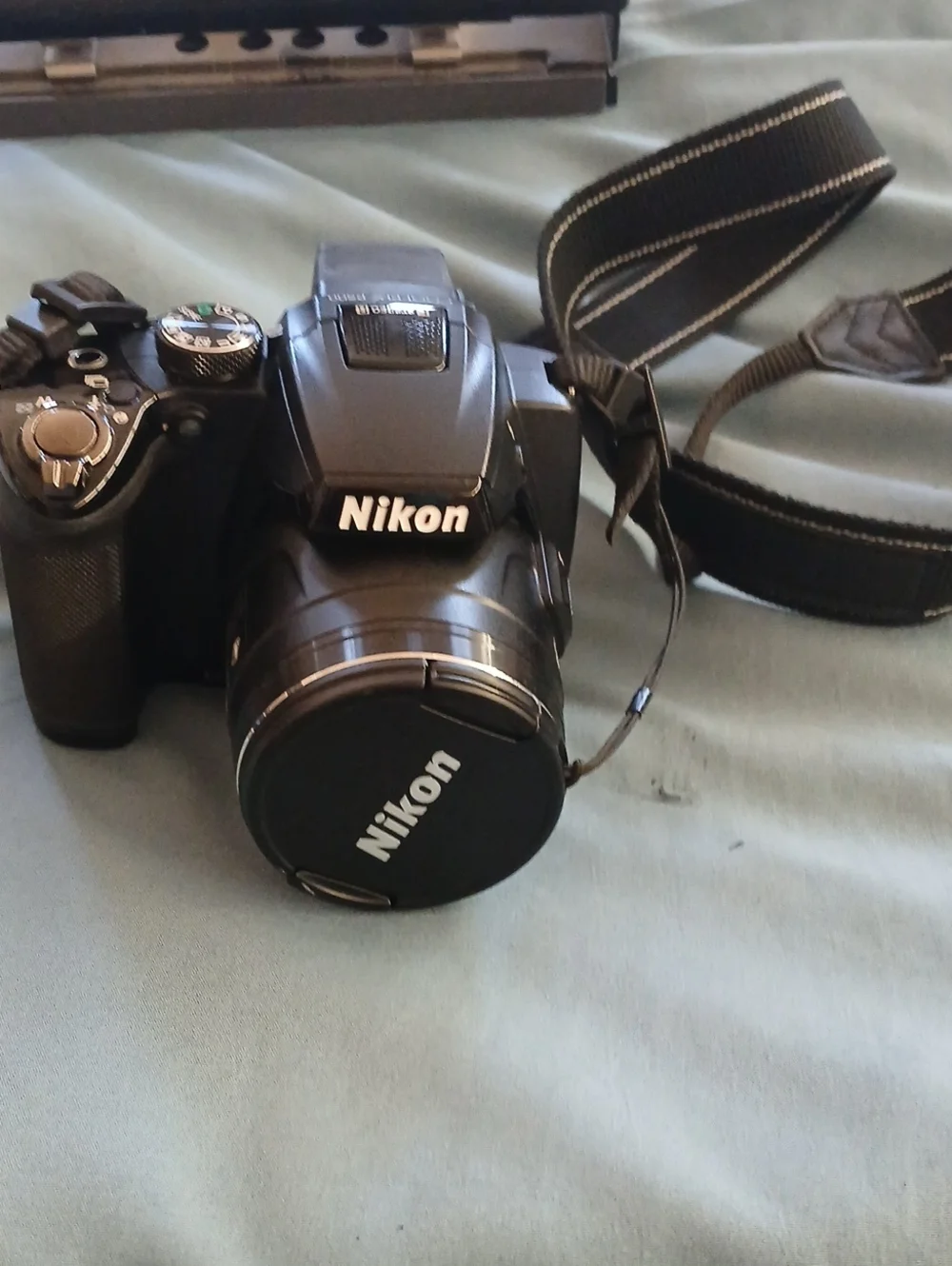 Nikon Black Compact DSLR-Style Digital Camera with Neck Strap